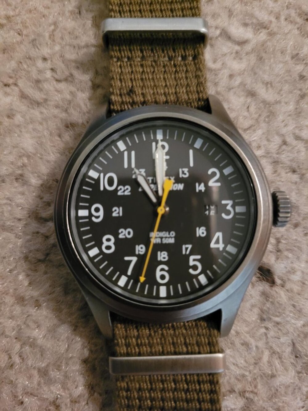 Like-new Timex Expedition watch with Indiglo backlight, green NATO fabric band